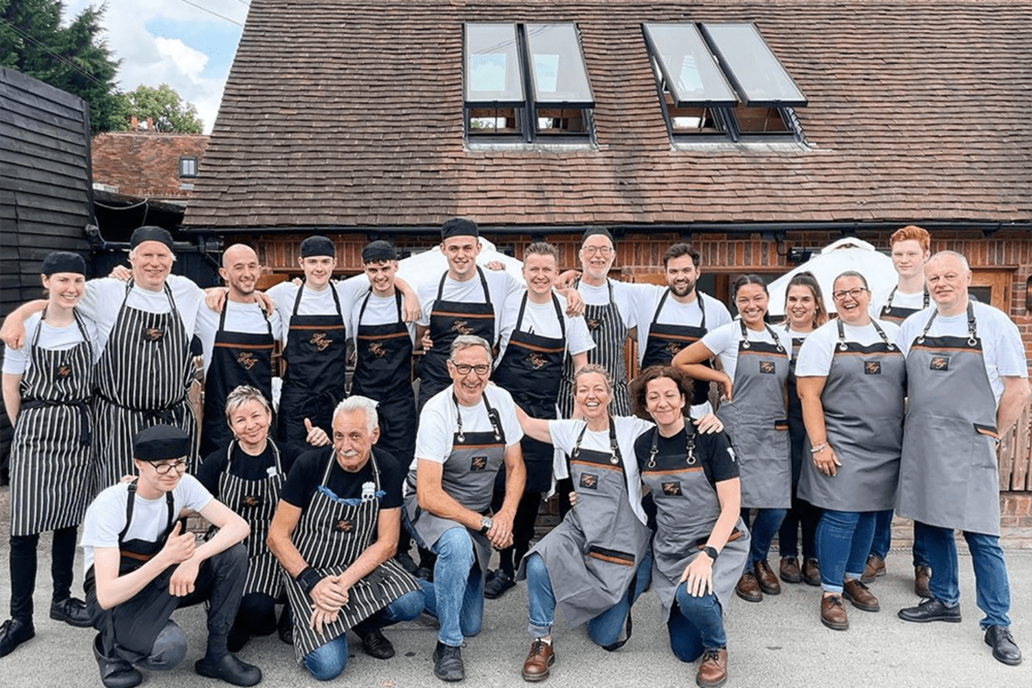 hand-and-flowers-bespoke-branded-aprons